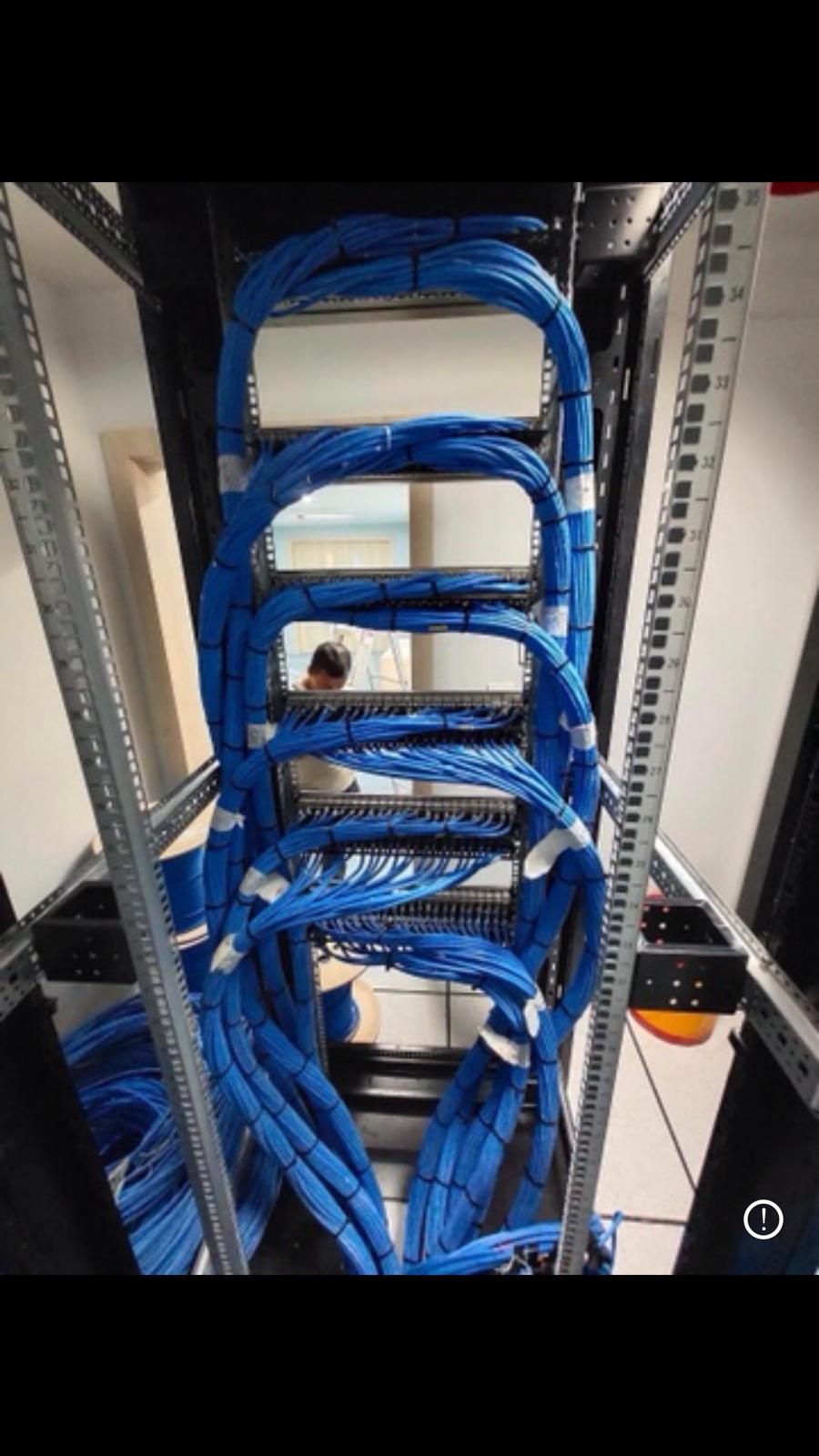 Security technician installing a CCTV camera